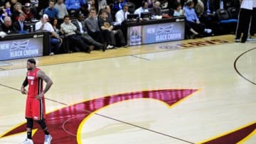 Mar 20, 2013; Cleveland, OH, USA; Miami Heat small forward LeBron James (6) stands at center court during a game against the Cleveland Cavaliers at Quicken Loans Arena. Miami won 98-95. Mandatory Credit: David Richard-USA TODAY Sports
