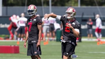 Jun 8, 2016; Santa Clara, CA, USA; San Francisco 49ers quarterback Blaine Gabbert (2) throws the ball with quarterback Colin Kaepernick (7) during minicamp at the San Francisco 49ers Practice Facility. Mandatory Credit: Kelley L Cox-USA TODAY Sports