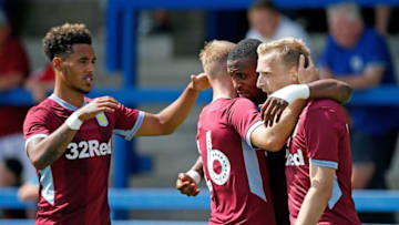 TELFORD, ENGLAND - JULY 14: Jonathan Kodjia of Aston Villa is congratulated by teammates following his goal during the Pre-season friendly between AFC Telford United and Aston Villa at New Bucks Head Stadium on July 14, 2018 in Telford, England. (Photo by Malcolm Couzens/Getty Images)