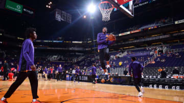 PHOENIX, AZ - OCTOBER 11: Derrick Jones Jr. #10 of the Phoenix Suns warms up before the preseason game against the Portland Trail Blazers on October 11, 2017 at Talking Stick Resort Arena in Phoenix, Arizona. NOTE TO USER: User expressly acknowledges and agrees that, by downloading and or using this photograph, user is consenting to the terms and conditions of the Getty Images License Agreement. Mandatory Copyright Notice: Copyright 2017 NBAE (Photo by Michael Gonzales/NBAE via Getty Images)