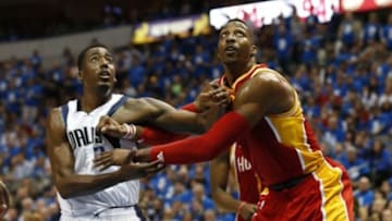 Apr 24, 2015; Dallas, TX, USA; Houston Rockets center Dwight Howard (12) blocks out against Dallas Mavericks forward Al-Farouq Aminu (7) in game three of the first round of the NBA Playoffs at American Airlines Center. Mandatory Credit: Matthew Emmons-USA TODAY Sports