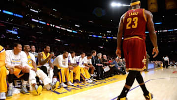 LOS ANGELES, CA - JANUARY 15: LeBron James #23 of the Cleveland Cavaliers jokes with Kobe Bryant #24 of the Los Angeles Lakers on the bench during the first half at Staples Center on January 15, 2015 in Los Angeles, California. NOTE TO USER: User expressly acknowledges and agrees that, by downloading and or using this Photograph, user is consenting to the terms and condition of the Getty Images License Agreement. (Photo by Harry How/Getty Images)