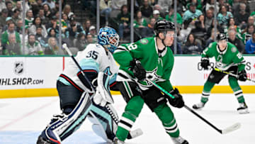 Mar 21, 2023; Dallas, Texas, USA; Seattle Kraken goaltender Joey Daccord (35) and Dallas Stars center Radek Faksa (12) in action during the game between the Dallas Stars and the Seattle Kraken at the American Airlines Center. Mandatory Credit: Jerome Miron-USA TODAY Sports