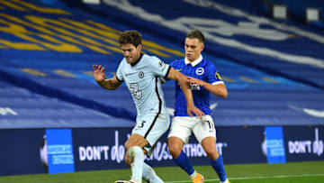 BRIGHTON, ENGLAND - SEPTEMBER 14: Marcos Alonso of Chelsea is put under pressure by Leandro Trossard of Brighton and Hove Albion during the Premier League match between Brighton & Hove Albion and Chelsea at American Express Community Stadium on September 14, 2020 in Brighton, England. (Photo by Glyn Kirk/Pool via Getty Images