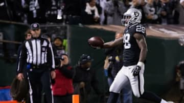 Dec 24, 2015; Oakland, CA, USA; Oakland Raiders running back Latavius Murray (28) scores a touchdown against the San Diego Chargers during the first quarter at O.co Coliseum. Mandatory Credit: Kelley L Cox-USA TODAY Sports