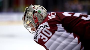 HERNING, DENMARK - MAY 12: Elvis Merzlikins, goaltender of Latvia looks on during the 2018 IIHF Ice Hockey World Championship Group B game between Latvia and Germany at Jyske Bank Boxen on May 12, 2018 in Herning, Denmark. (Photo by Martin Rose/Getty Images)