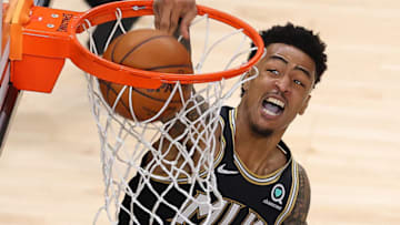 John Collins #20 of the Atlanta Hawks dunks against the New York Knicks (Photo by Kevin C. Cox/Getty Images)