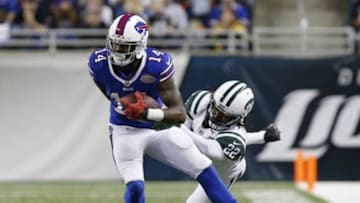 Nov 24, 2014; Detroit, MI, USA; Buffalo Bills wide receiver Sammy Watkins (14) breaks a tackle by New York Jets defensive back Marcus Williams (22) after making a catch during the second half at Ford Field. Mandatory Credit: Kevin Hoffman-USA TODAY Sports