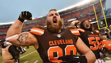 Dec 24, 2016; Cleveland, OH, USA; Cleveland Browns defensive end Jamie Meder (98) and nose tackle Danny Shelton (55) celebrate after the Cleveland Browns beat the San Diego Chargers at FirstEnergy Stadium. The Browns won 20-17. Mandatory Credit: Ken Blaze-USA TODAY Sports