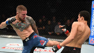 MEXICO CITY, MEXICO - SEPTEMBER 21: (L-R) Steven Peterson kicks Martin Bravo of Mexico in their featherweight bout during the UFC Fight Night event on September 21, 2019 in Mexico City, Mexico. (Photo by Josh Hedges/Zuffa LLC/Zuffa LLC via Getty Images)