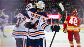 Sep 26, 2021; Calgary, Alberta, CAN; Edmonton Oilers center Xavier Bourgault (54) celebrates his goal with teammates against the Calgary Flames during the second period at Scotiabank Saddledome. Mandatory Credit: Sergei Belski-USA TODAY Sports