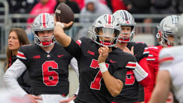 Ohio State Buckeyes quarterback C.J. Stroud (7) throws in front of quarterbacks Kyle McCord (6) and Devin Brown (15) during the spring football game at Ohio Stadium in Columbus on April 16, 2022.Ncaa Football Ohio State Spring Game