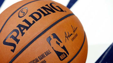 INDIANAPOLIS, IN - OCTOBER 11: A detail view of official Spalding NBA logo basketball on the floor during a preseason game between the Chicago Bulls and Indiana Pacers at Bankers Life Fieldhouse on October 11, 2019 in Indianapolis, Indiana. The Pacers defeated the Bulls 105-87. NOTE TO USER: User expressly acknowledges and agrees that, by downloading and or using this Photograph, user is consenting to the terms and conditions of the Getty Images License Agreement. (Photo by Joe Robbins/Getty Images)