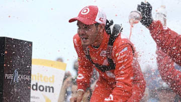 Aug 28, 2016; Brooklyn, MI, USA; Sprint Cup Series driver Kyle Larson (42) celebrates winning his first Sprint Cup Series race during the Pure Michigan 400 at the Michigan International Speedway. Mandatory Credit: Aaron Doster-USA TODAY Sports