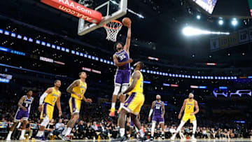 LOS ANGELES, CA - OCTOBER 04: Marvin Bagley III #35 of the Sacramento Kings scores a basket against LeBron James #23 of the Los Angeles Lakers during the first half at Staples Center on October 4, 2018 in Los Angeles, California. NOTE TO USER: User expressly acknowledges and agrees that, by downloading and or using this photograph, User is consenting to the terms and conditions of the Getty Images License Agreement. (Photo by Kevork Djansezian/Getty Images)