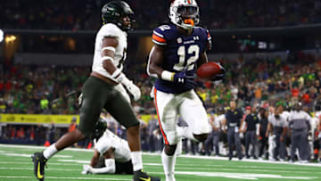 Auburn footballAug 31, 2019; Arlington, TX, USA; Auburn Tigers receiver Eli Stove (12) scores a third quarter touchdown against the Oregon Ducks at AT&T Stadium. Mandatory Credit: Matthew Emmons-USA TODAY Sports