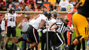 COLUMBIA, MO - SEPTEMBER 21: D.J. Wonnum #8 of the South Carolina Gamecocks returns an interception back to the Missouri Tigers 1-yard line in the second quarter at Faurot Field/Memorial Stadium on September 21, 2019 in Columbia, Missouri. (Photo by David Eulitt/Getty Images)