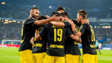 HAMBURG, GERMANY - SEPTEMBER 20: Christian Pulisic of Borussia Dortmund celebrates scoring the goal to the 0:3 together with his team mates during the Bundesliga match between Hamburger SV and Borussia Dortmund at the Volksparkstadion on September 20, 2017 in Hamburg, Germany. (Photo by Alexandre Simoes/Borussia Dortmund/Getty Images)