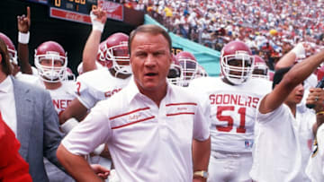 24 SEP 1988: UNIVERSITY OF OKLAHOMA FOOTBALL COACH BARRY SWITZER LEADS HIS TEAM ON THE FIELD BEFORE THE SOONERS 23-7 LOSS TO THE USC TROJANS. Mandatory Credit: Stephen Dunn/ALLSPORT