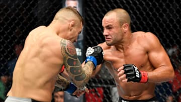 CALGARY, AB - JULY 28: (R-L) Eddie Alvarez punches Dustin Poirier in their lightweight bout during the UFC Fight Night event at Scotiabank Saddledome on July 28, 2018 in Calgary, Alberta, Canada. (Photo by Jeff Bottari/Zuffa LLC/Zuffa LLC via Getty Images)