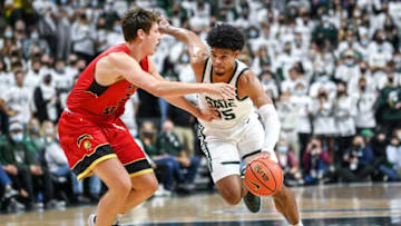 Michigan State's Malik Hall, right, moves to the basket as Ferris State's Reece Hazelton defends during the first half on Wednesday, Oct. 27, 2021, at the Breslin Center in East Lansing.211027 Msu Ferris 058a