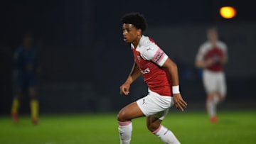 BOREHAMWOOD, ENGLAND - MARCH 29: Xavier Amaechi of Arsenal runs with the ball during the Premier League 2 match between Arsenal and West Ham United at Meadow Park on March 29, 2019 in Borehamwood, England. (Photo by Harriet Lander/Getty Images)