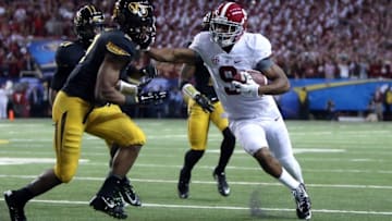 Dec 6, 2014; Atlanta, GA, USA; Missouri Tigers safety Braylon Webb (9) forces Alabama Crimson Tide wide receiver Amari Cooper (9) out of bounds in the first quarter of the 2014 SEC Championship at the Georgia Dome. Alabama beat Missouri 42-13. Mandatory Credit: Jason Getz-USA TODAY Sports