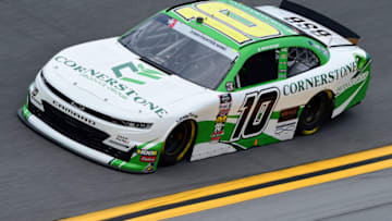 DAYTONA BEACH, FLORIDA - JULY 05: AJ Allmendinger, driver of the #10 Cornerstone Produce Group Chevrolet, qualifies for the NASCAR Xfinity Series Circle K Firecracker 250 Powered by Coca-Cola at Daytona International Speedway on July 05, 2019 in Daytona Beach, Florida. (Photo by Jared C. Tilton/Getty Images)