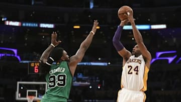 Apr 3, 2016; Los Angeles, CA, USA; Los Angeles Lakers forward Kobe Bryant (24) shoots over Boston Celtics