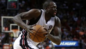 Dec 13, 2015; Miami, FL, USA; Miami Heat forward Luol Deng (9) drives to the basket against the Memphis Grizzlies during the second half at American Airlines Arena. The Heat won 100-97. Mandatory Credit: Steve Mitchell-USA TODAY Sports