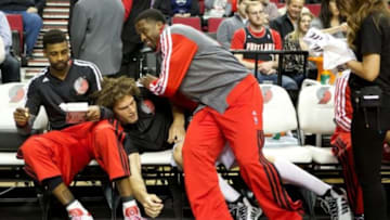 Feb 23, 2014; Portland, OR, USA; Portland Trail Blazers shooting guard Wesley Matthews (2) plays around with center Robin Lopez (42) prior to the game against Minnesota Timberwolves in the first half at Moda Center. Mandatory Credit: Jaime Valdez-USA TODAY Sports