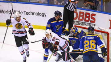 Apr 15, 2016; St. Louis, MO, USA; Chicago Blackhawks center Andrew Shaw (65) celebrates with teammate Patrick Kane (88) after scoring a goal against St. Louis Blues goalie Brian Elliott (1) during the third period in game two of the first round of the 2016 Stanley Cup Playoffs at Scottrade Center. The Blackhawks won the game 3-2. Mandatory Credit: Billy Hurst-USA TODAY Sports