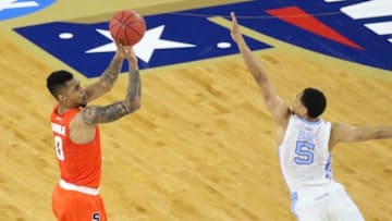 Apr 2, 2016; Houston, TX, USA; North Carolina Tar Heels guard Marcus Paige (5) guards Syracuse Orange forward Michael Gbinije (0) during the first half in the 2016 NCAA Men