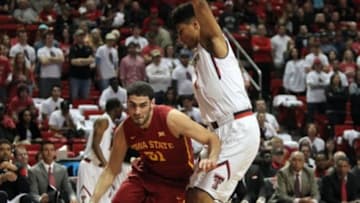 Jan 24, 2015; Lubbock, TX, USA; Iowa State Cyclones forward Georges Niang (31) dribbles the ball around Texas Tech Red Raiders center Isaiah Manderson (1) in the first half at United Supermarkets Arena. Mandatory Credit: Michael C. Johnson-USA TODAY Sports