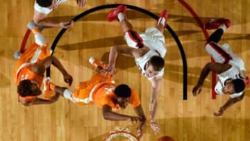 Jan 13, 2016; Athens, GA, USA; Tennessee Volunteers forward Kyle Alexander (11) fights for a rebound with Georgia Bulldogs forward Kenny Paul Geno (25) at Stegeman Coliseum. Georgia defeated Tennessee 81-72. Mandatory Credit: Dale Zanine-USA TODAY Sports