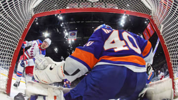 UNIONDALE, NEW YORK - MAY 01: Semyon Varlamov #40 of the New York Islanders defends the net against Pavel Buchnevich #89 of the New York Rangers during the second period at the Nassau Coliseum on May 01, 2021 in Uniondale, New York. The Islanders shut-out the Rangers 3-0 and with the victory, the Islanders clinched a playoff berth to the 2021 Stanley Cup Playoffs. (Photo by Bruce Bennett/Getty Images)