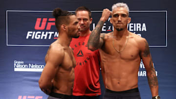 BRASILIA, BRAZIL - MARCH 13: (L-R) Opponents Kevin Lee of the United States and Charles Oliveira of Brazil face off during during the UFC Fight Night Lee v Oliveira weigh-in at Windsor Plaza Hotel on March 13, 2020 in Brasilia, Brazil. (Photo by Buda Mendes/Zuffa LLC)