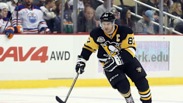 Nov 8, 2016; Pittsburgh, PA, USA; Pittsburgh Penguins center Sidney Crosby (87) chases the puck against the Edmonton Oilers during the second period at the PPG Paints Arena. Mandatory Credit: Charles LeClaire-USA TODAY Sports