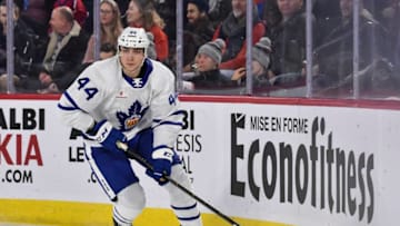 LAVAL, QC - MARCH 08: Kristians Rubins #44 of the Toronto Marlies skates the puck against the Laval Rocket during the AHL game at Place Bell on March 8, 2019 in Laval, Quebec, Canada. The Toronto Marlies defeated the Laval Rocket 3-0. (Photo by Minas Panagiotakis/Getty Images)