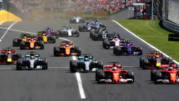 BUDAPEST, HUNGARY - JULY 30: Kimi Raikkonen of Finland driving the (7) Scuderia Ferrari SF70H and Sebastian Vettel of Germany driving the (5) Scuderia Ferrari SF70H (Photo by Mark Thompson/Getty Images)