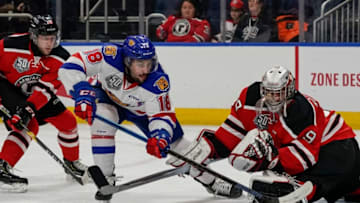 QUEBEC CITY, QC - NOVEMBER 20: Anthony Morrone #39 of the Quebec Remparts makes a save on Jacob Stewart #19 of the Moncton Wildcats during their QMJHL hockey game at the Videotron Center on November 20, 2018 in Quebec City, Quebec, Canada. (Photo by Mathieu Belanger/Getty Images)