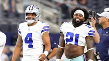 ARLINGTON, TX - AUGUST 26: Dak Prescott #4 of the Dallas Cowboys and Ezekiel Elliott #21 of the Dallas Cowboys smile during warm ups before the preseason game against the Arizona Cardinals at AT&T Stadium on August 26, 2018 in Arlington, Texas. (Photo by Richard Rodriguez/Getty Images)