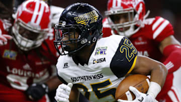 NEW ORLEANS, LA - DECEMBER 17: Ito Smith #25 of the Southern Miss Golden Eagles runs with the ball during the second half of a game against the Louisiana-Lafayette Ragin Cajuns at the Mercedes-Benz Superdome on December 17, 2016 in New Orleans, Louisiana (Photo by Jonathan Bachman/Getty Images)