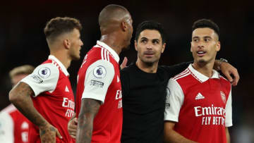 Arsenal's Spanish manager Mikel Arteta (2R) walks off of the pitch with Arsenal's Brazilian defender Gabriel Magalhaes (C) and Arsenal's Brazilian midfielder Gabriel Martinelli (R) following the English Premier League football match between Arsenal and Aston Villa at the Emirates Stadium in London on August 31, 2022. - - RESTRICTED TO EDITORIAL USE. No use with unauthorized audio, video, data, fixture lists, club/league logos or 'live' services. Online in-match use limited to 120 images. An additional 40 images may be used in extra time. No video emulation. Social media in-match use limited to 120 images. An additional 40 images may be used in extra time. No use in betting publications, games or single club/league/player publications. (Photo by Adrian DENNIS / AFP) / RESTRICTED TO EDITORIAL USE. No use with unauthorized audio, video, data, fixture lists, club/league logos or 'live' services. Online in-match use limited to 120 images. An additional 40 images may be used in extra time. No video emulation. Social media in-match use limited to 120 images. An additional 40 images may be used in extra time. No use in betting publications, games or single club/league/player publications. / RESTRICTED TO EDITORIAL USE. No use with unauthorized audio, video, data, fixture lists, club/league logos or 'live' services. Online in-match use limited to 120 images. An additional 40 images may be used in extra time. No video emulation. Social media in-match use limited to 120 images. An additional 40 images may be used in extra time. No use in betting publications, games or single club/league/player publications. (Photo by ADRIAN DENNIS/AFP via Getty Images)