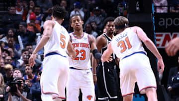 BROOKLYN, NY - JANUARY 15: Trey Burke #23 of the New York Knicks high fives his teammates during the game against the Brooklyn Nets on January 15, 2018 at Barclays Center in Brooklyn, New York. Copyright 2018 NBAE (Photo by Nathaniel S. Butler/NBAE via Getty Images)