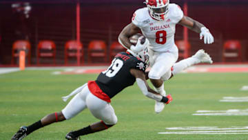 LINCOLN, NE - OCTOBER 26: Running back Stevie Scott III #8 of the Indiana Hoosiers tries to avoid a tackle from safety Marquel Dismuke #19 of the Nebraska Cornhuskers at Memorial Stadium on October 26, 2019 in Lincoln, Nebraska. (Photo by Steven Branscombe/Getty Images)