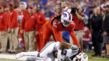 Sep 15, 2016; Orchard Park, NY, USA; Buffalo Bills wide receiver Sammy Watkins (14) tackles New York Jets cornerback Marcus Williams (20) after he makes a interception during the second half at New Era Field. The Jets beat the Bills 37 to 31. Mandatory Credit: Timothy T. Ludwig-USA TODAY Sports