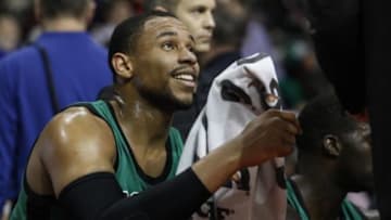 Apr 5, 2014; Auburn Hills, MI, USA; Boston Celtics center Jared Sullinger (7) smiles on the bench during the third quarter against the Detroit Pistons at The Palace of Auburn Hills. Pistons beat the Celtics 115-111. Mandatory Credit: Raj Mehta-USA TODAY Sports