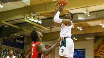 LAHAINA, HI - NOVEMBER 26: Aaron Henry #11 of the Michigan State Spartans shoots over Anthony Edwards #5 of the Georgia Bulldogs during the first half at the Lahaina Civic Center on November 26, 2019 in Lahaina, Hawaii. (Photo by Darryl Oumi/Getty Images)