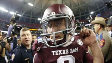 Dec 31, 2013; Atlanta, GA, USA; Texas A&M Aggies quarterback Johnny Manziel (2) celebrates defeating the Duke Blue Devils during the 2013 Chick-fil-A Bowl at the Georgia Dome. Texas A&M won 52-48. Mandatory Credit: Paul Abell-USA TODAY Sports